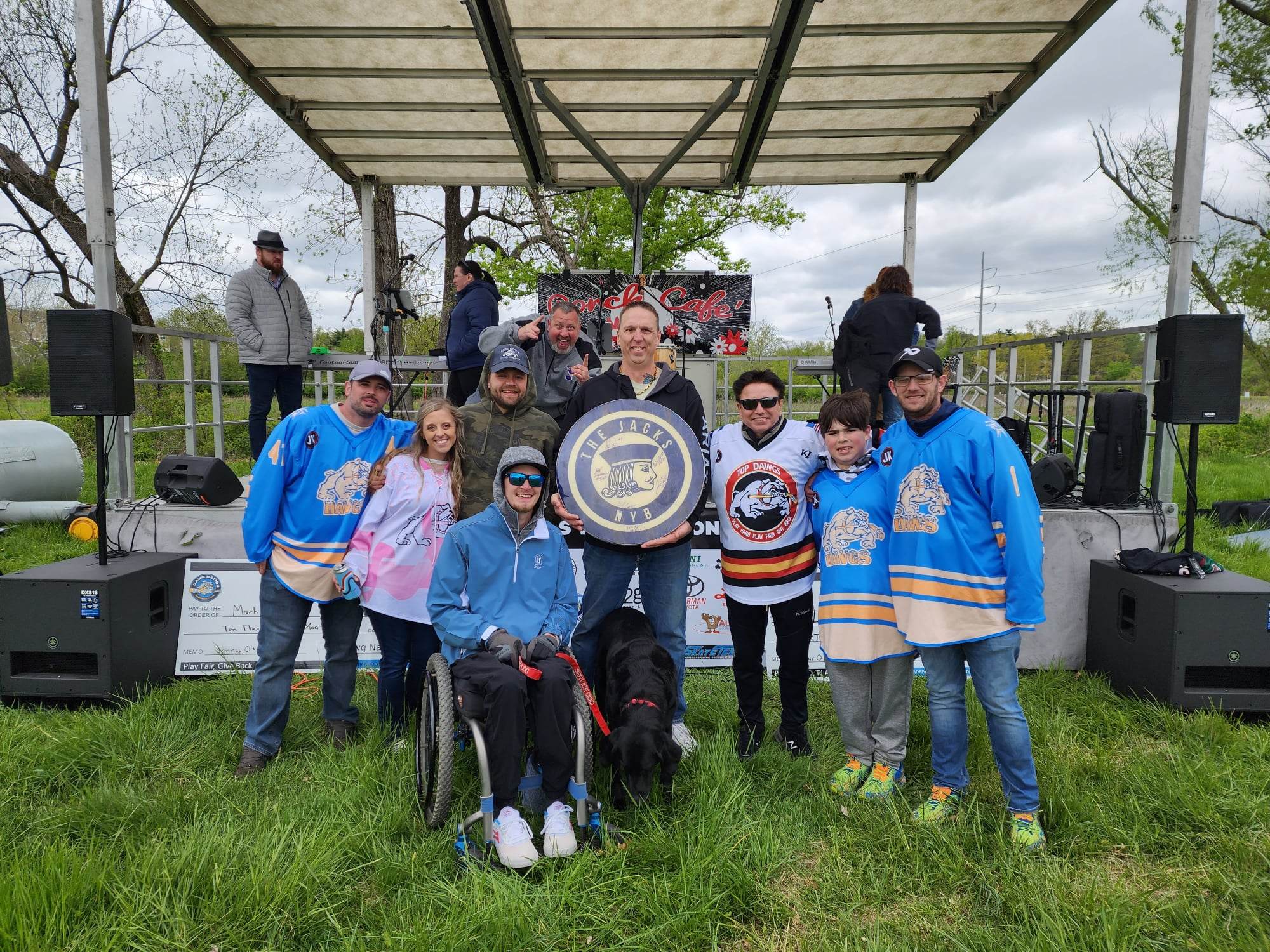 group on a field for johnny o's