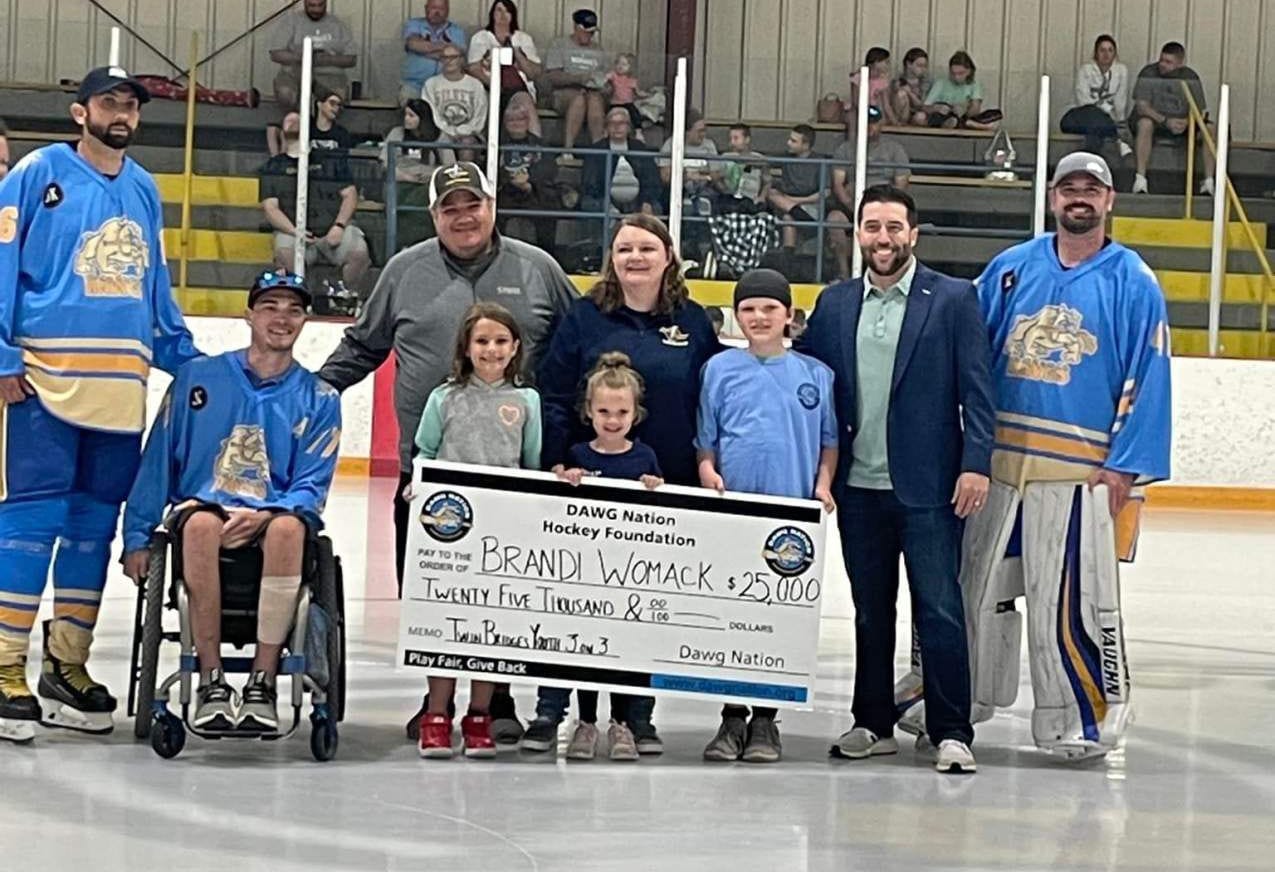 family receiving check