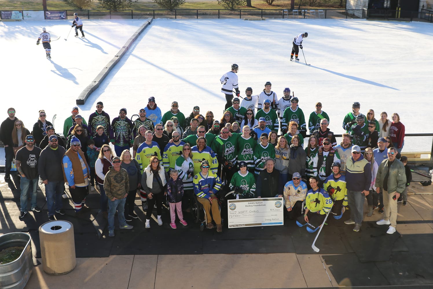 group of hockey players at a pond